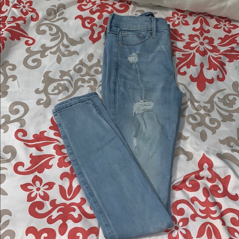 Light blue ripped jeans